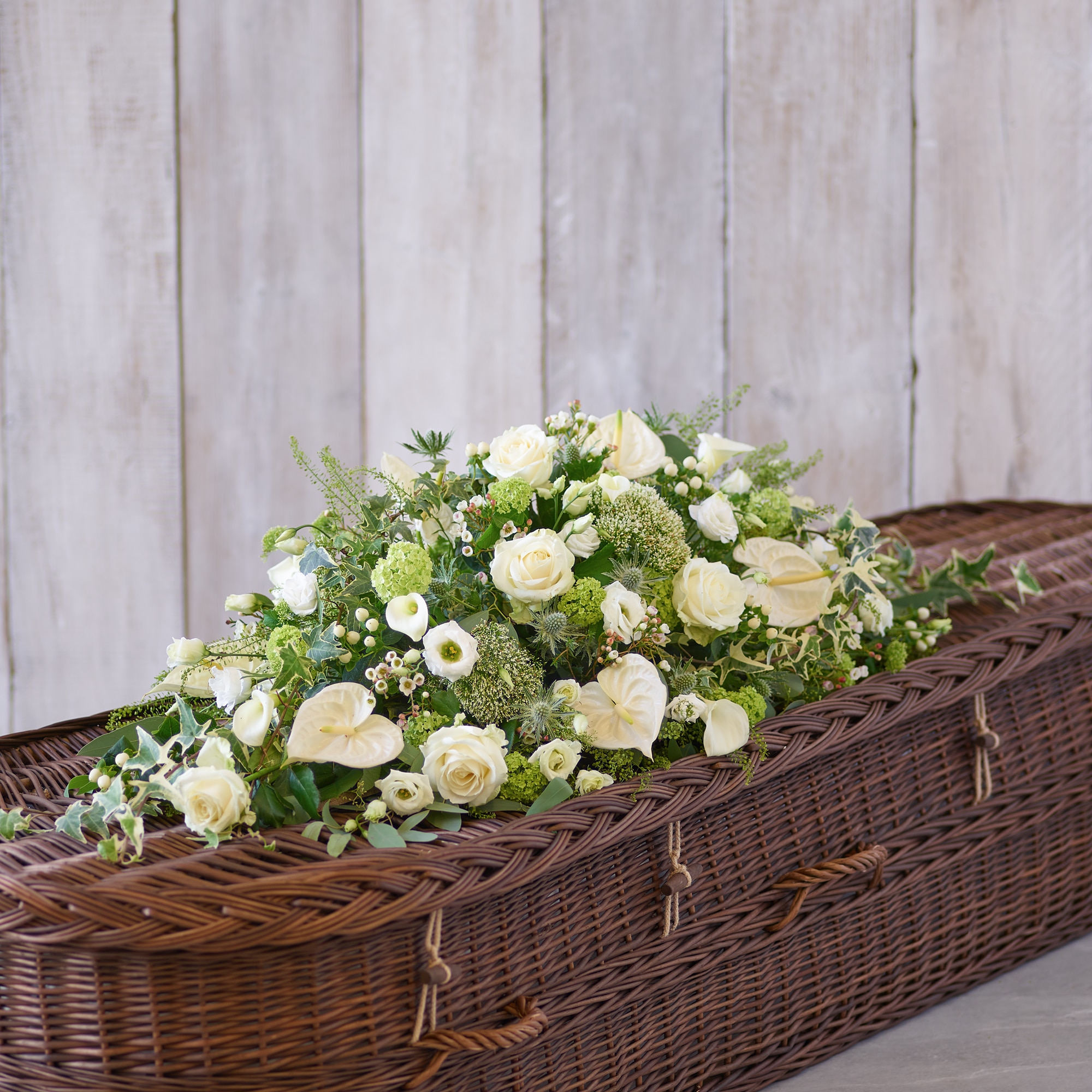 White and Green Casket Spray size,  inches height and  inches wide.